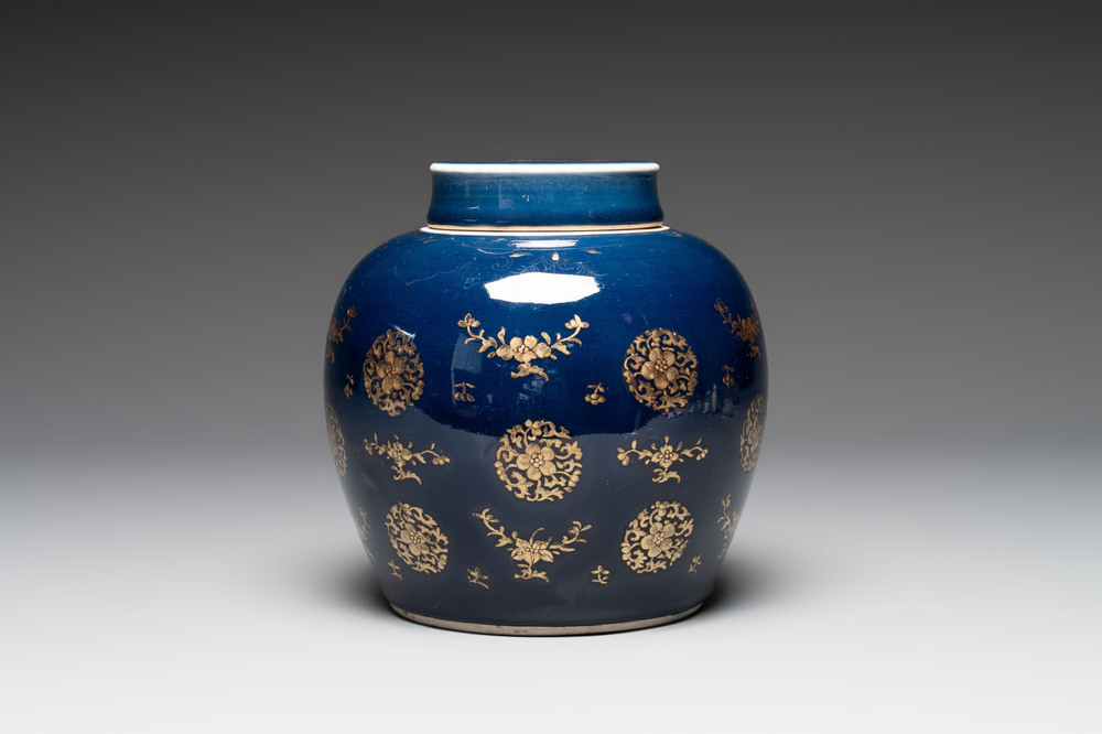 A Chinese gilt-decorated blue-ground jar and cover with floral design, Qianlong