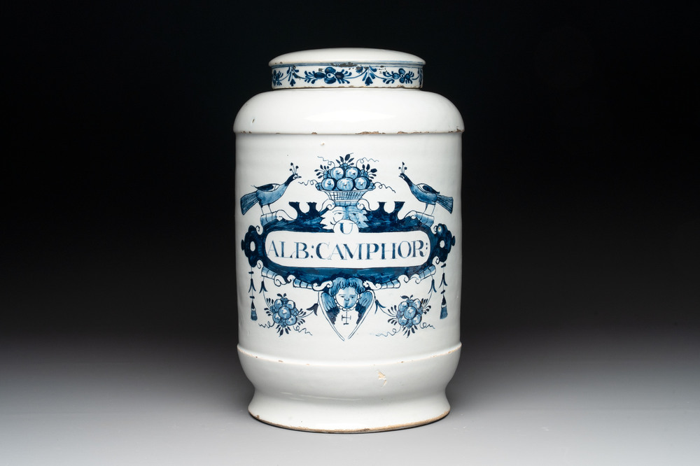 A rare large blue and white Dutch Delft albarello with original cover, 18th C.