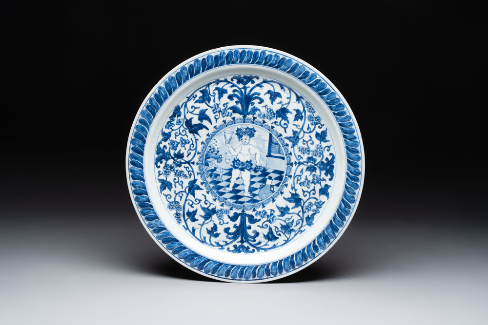 A rare and large Chinese blue and white 'Bacchus' dish, Kangxi