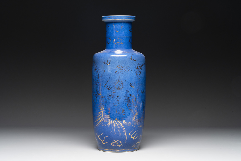 A Chinese gilt-decorated powder-blue 'dragon and phoenix' rouleau vase, 19th C.
