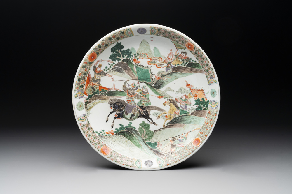 A Chinese famille verte 'warriors on horseback' dish, lingzhi mark, Kangxi