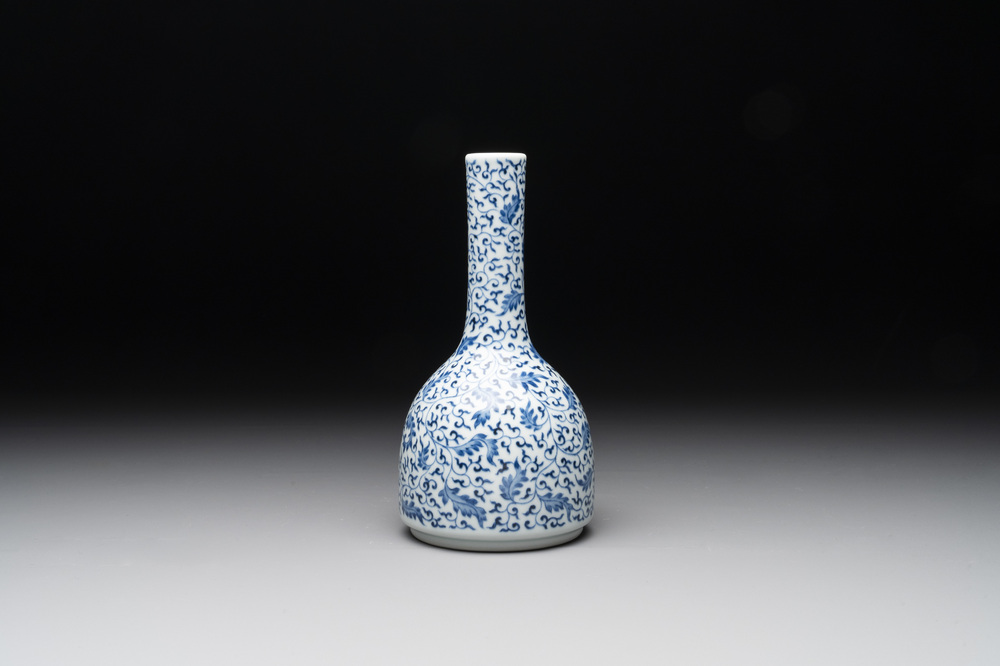 A Chinese blue and white 'lotus scroll' bottle vase, Yongzheng mark, 19/20th C.