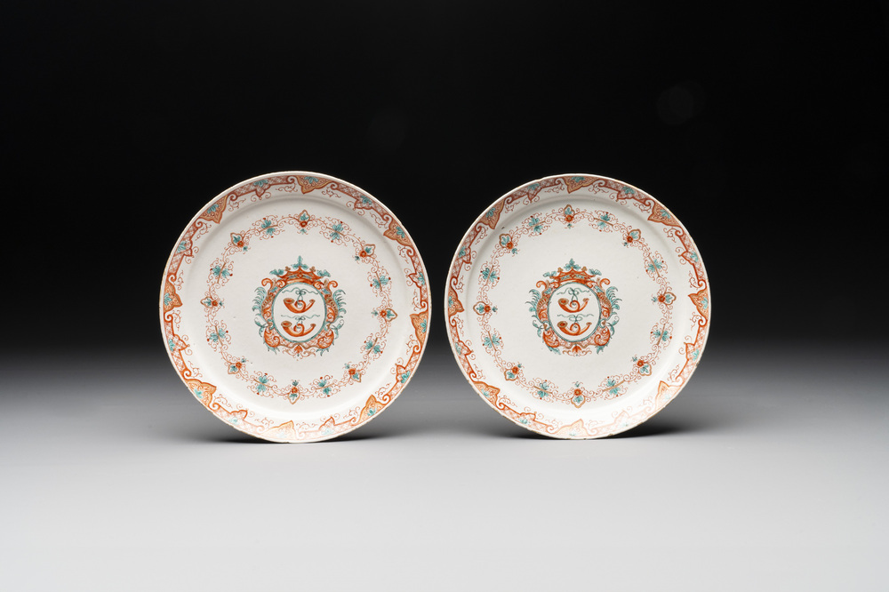 A pair of polychrome Dutch Delft dor&eacute; armorial plates, dated 1728