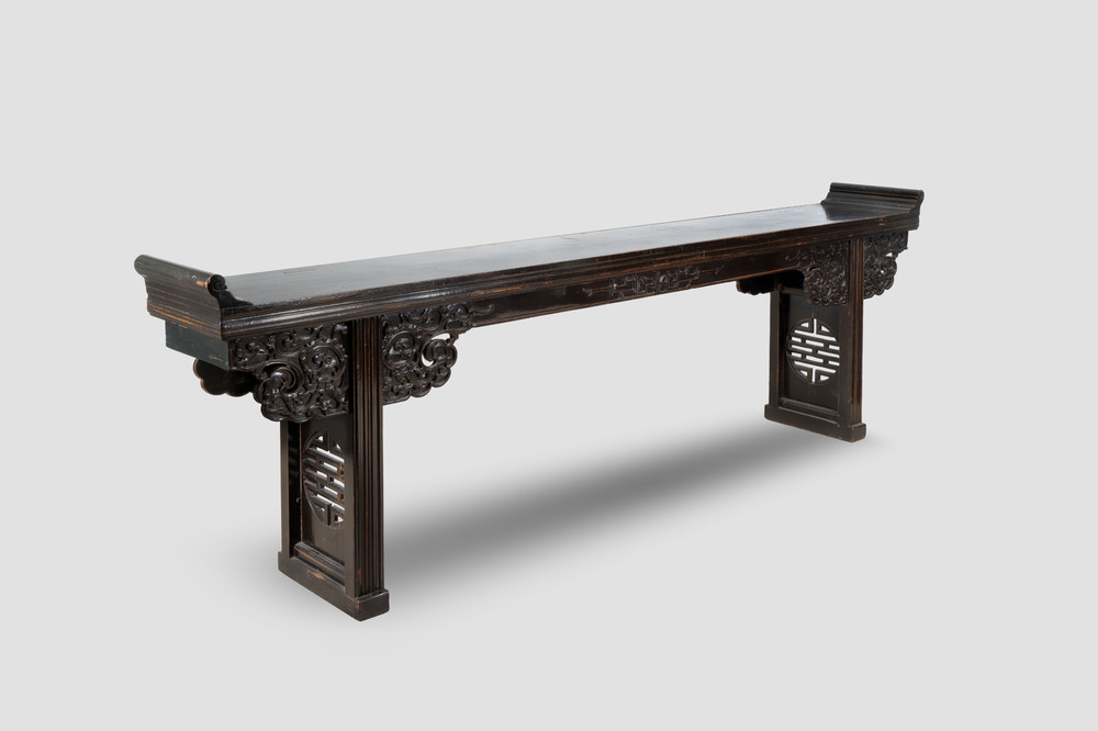A massive Chinese red-and-black-lacquered altar table, 'qiaotouan', Qing