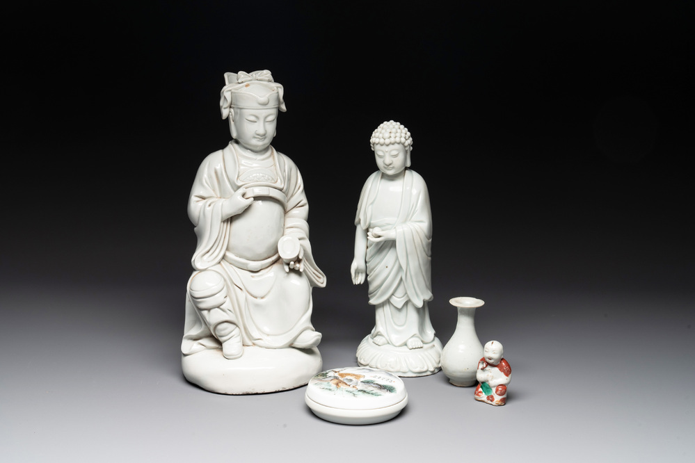 Two Chinese Dehua blanc de Chine Buddha and Wenchang figures, a seal paste covered box, a vase and an iron-red-glazed boy, Qianlong mark, 19/20th C.
