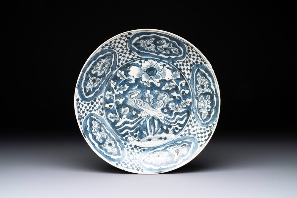 A Chinese Swatow blue and white 'phoenixes' dish, Ming