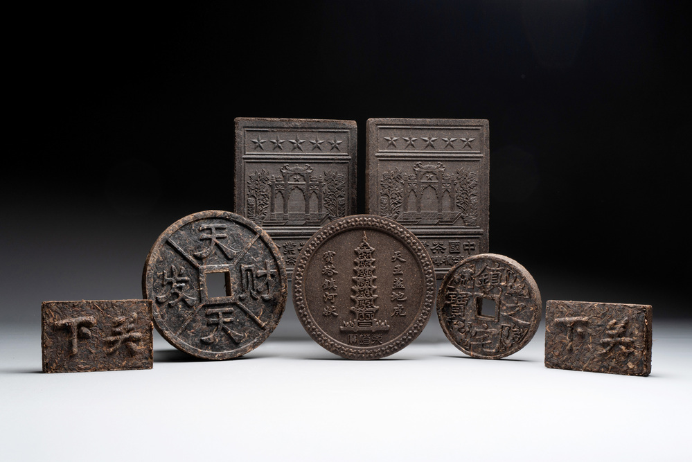Seven Chinese Pu'er tea and black tea bricks, 20th C.