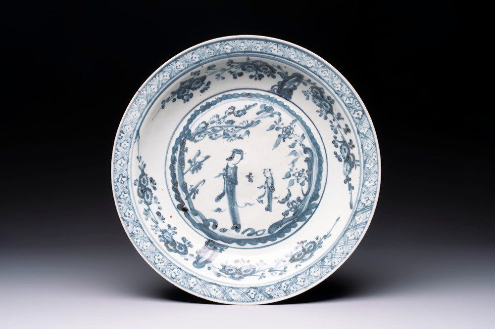 A Chinese Swatow blue and white 'lady and a boy' dish, Ming