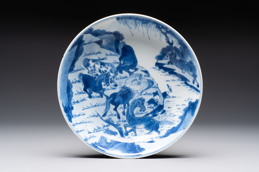 A Chinese blue and white 'Yu Ma Tu 浴馬圖' plate, Kangxi mark and of the period