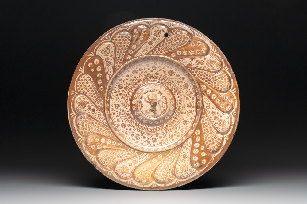 A Hispano-Moresque lustre-glazed armorial dish, Spain, 16th C.