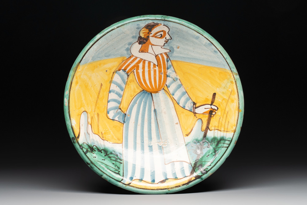 An Italian maiolica dish with a lady, Montelupo, 17th C.