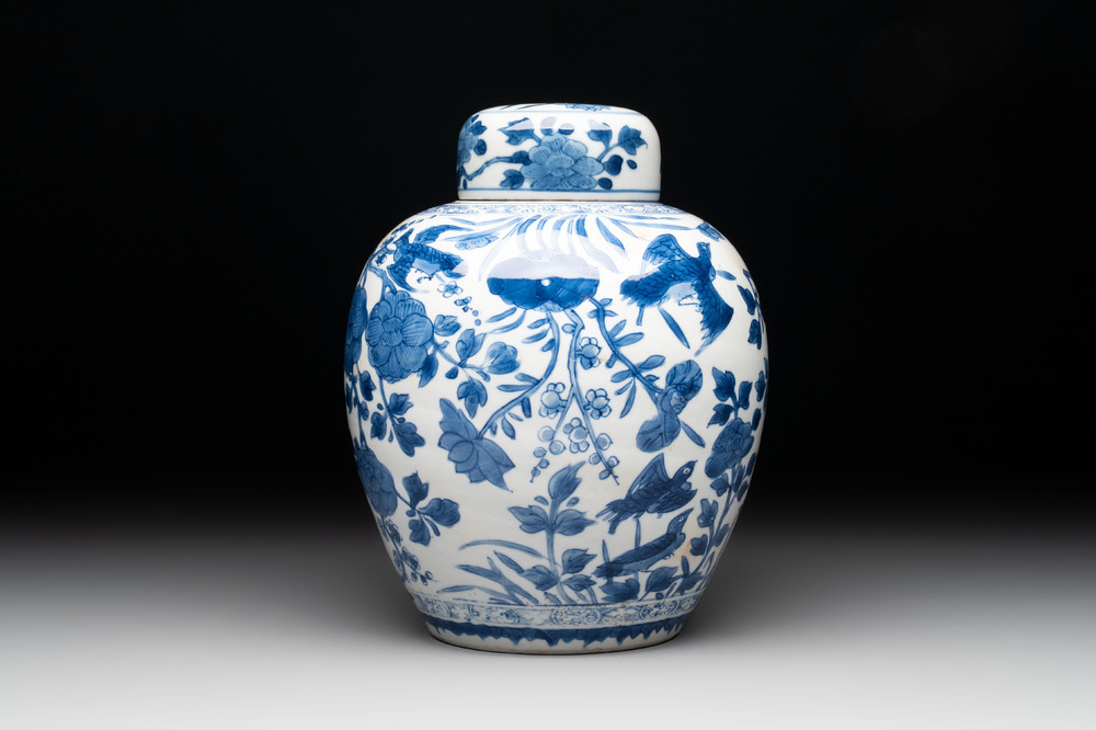 A Chinese blue and white 'birds among flowers' vase and cover, Kangxi