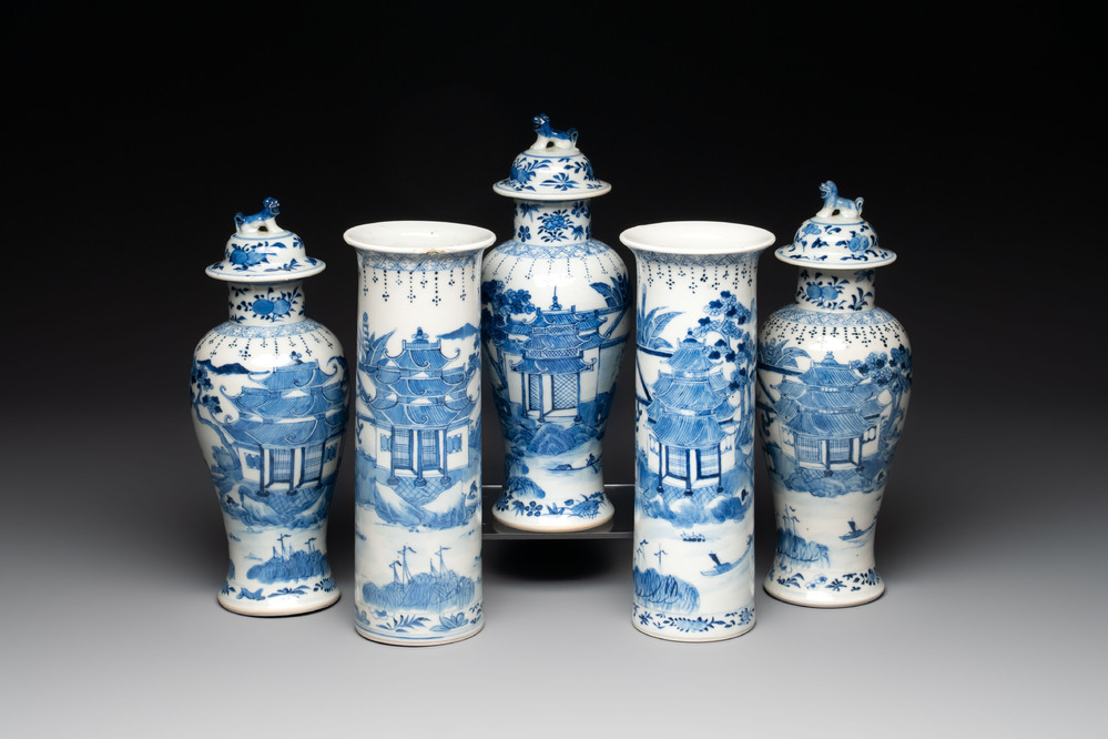 A Chinese blue and white garniture of five vases with landscape design, 19th C.