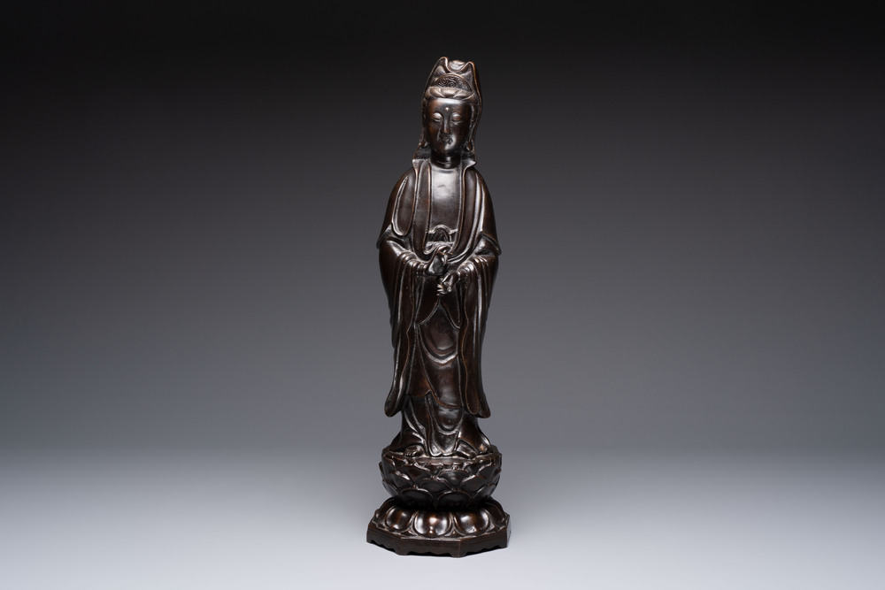 A Chinese bronze Guanyin standing on a lotus throne, 19th C.