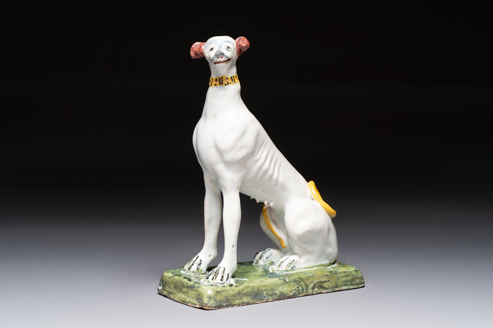 A polychrome Brussels faience greyhound, 18th C.