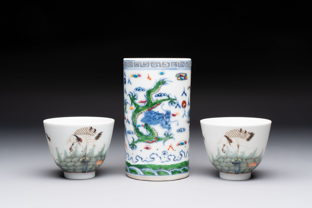 A pair of Chinese famille rose 'crane' cups and a 'dragon' brush pot, Guangxu mark, 20th C.