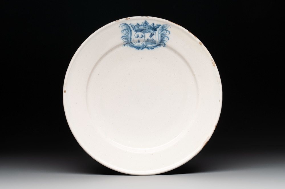 A blue and white Dutch Delft armorial dish, 17th C.