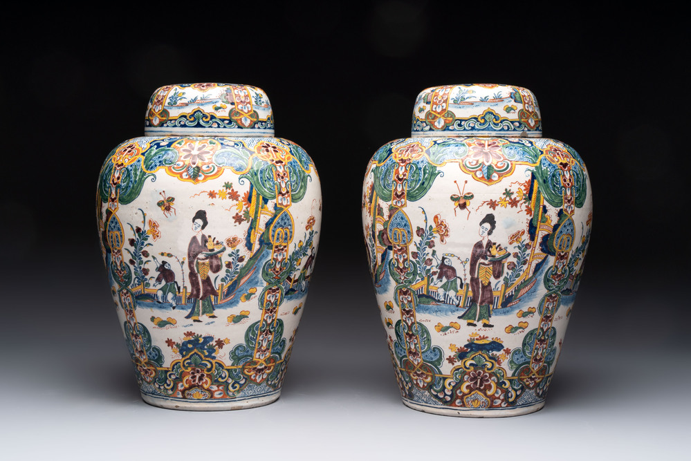 A rare pair of polychrome Dutch Delft chinoiserie jars and covers, 18th C.