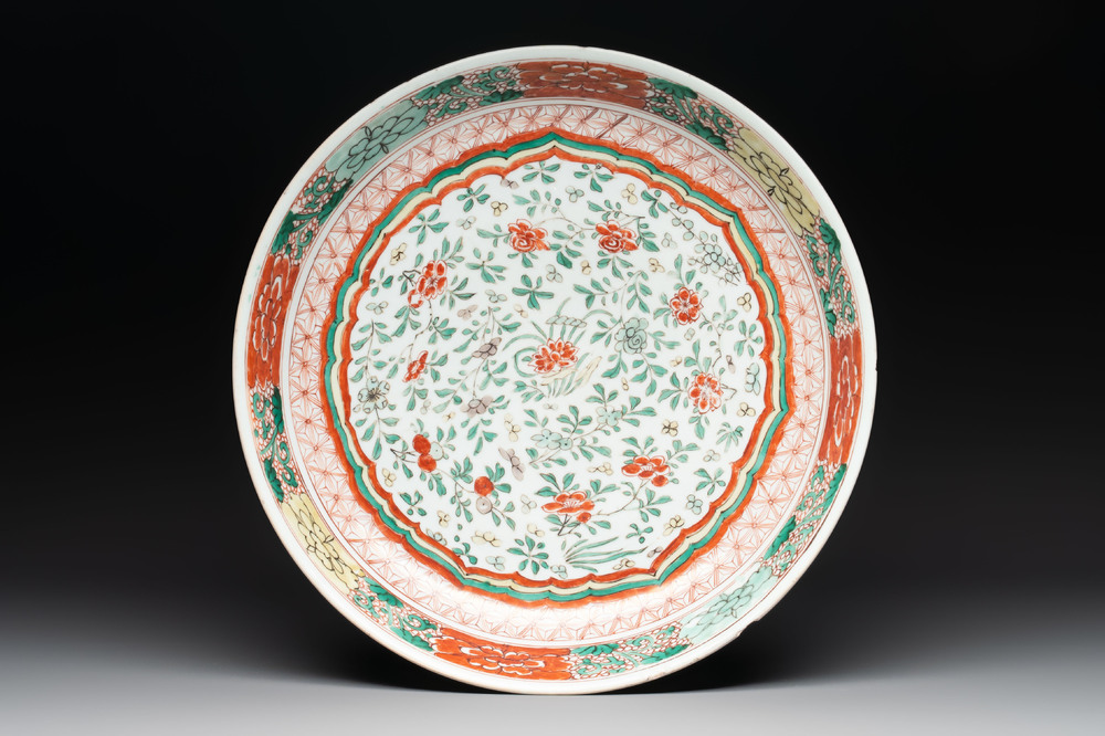 A Chinese wucai dish with floral design, Kangxi mark and of the period