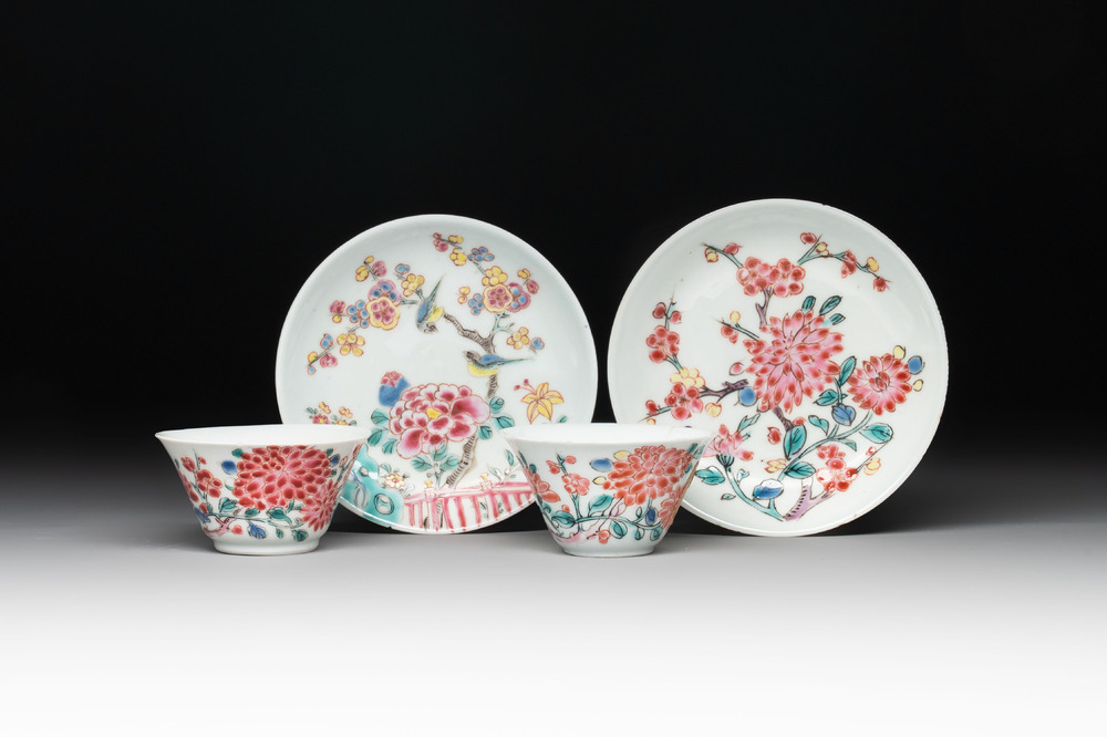 Two Chinese famille rose 'birds on flowering branches' cups and saucers, Yongzheng