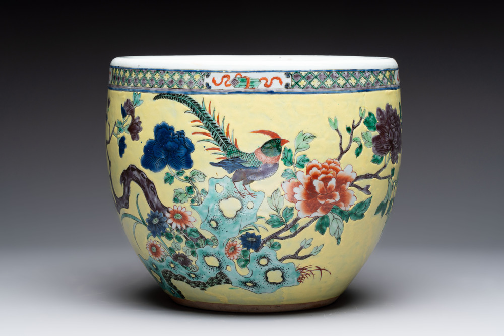 A Chinese famille rose yellow-ground 'pheasant and peony' scroll pot, 19th C.