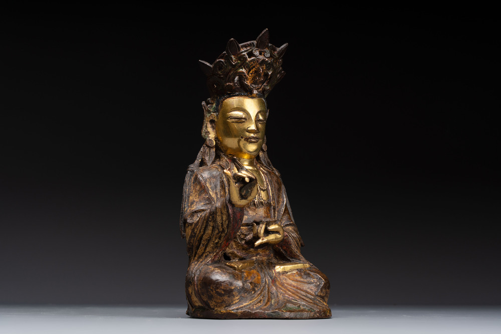 A Chinese parcel-gilt bronze Guanyin, Ming