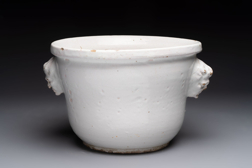 A white French Delftware jardini&egrave;re, dated August 1770
