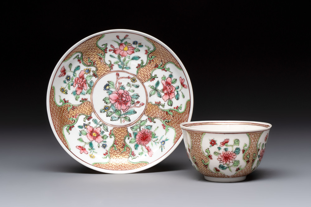 A fine Chinese gilt-decorated famille rose cup and saucer with floral design, Yongzheng