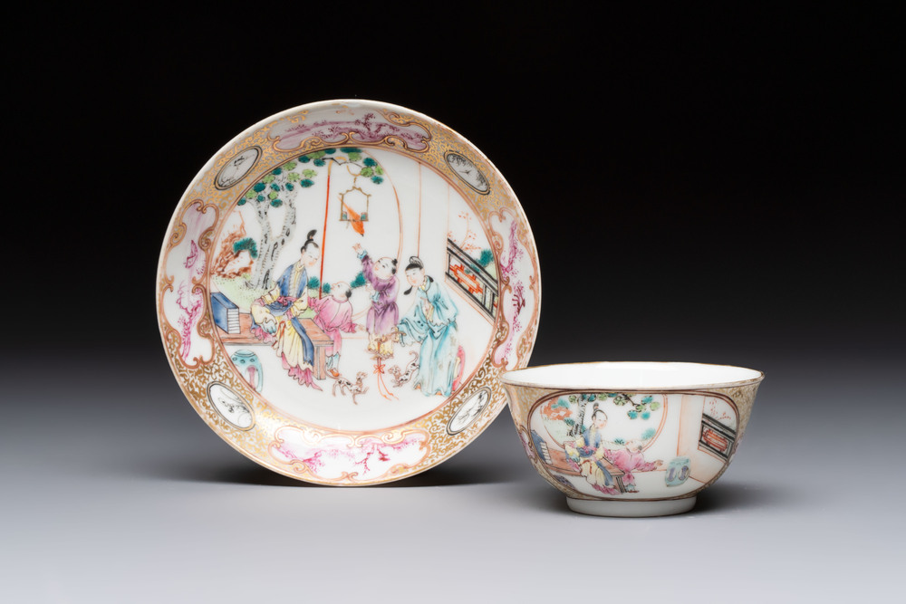 A Chinese Canton famille rose 'mandarin subject' cup and saucer, Qianlong