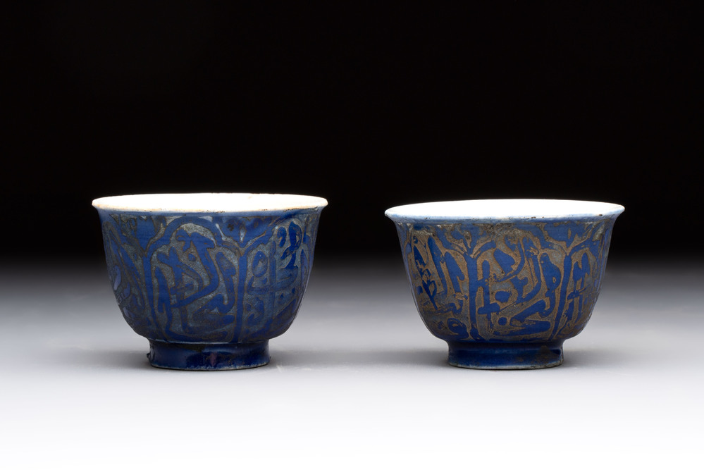 A rare pair of Chinese sacrificial blue-glazed and engraved cups for the Islamic market, 18th C.