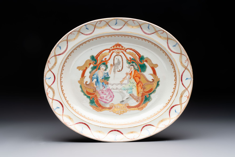 A Chinese famille rose gilt-decorated 'European subject' charger, 20th C.