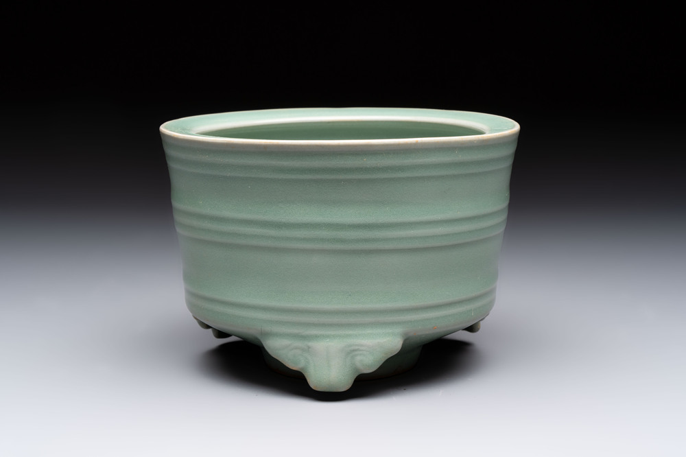 A Chinese Longquan celadon cylindrical tripod censer with trigrams design, Yuan/Ming