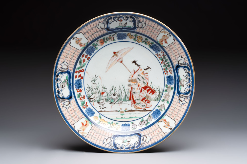 A large Japanese Imari 'Parasol Ladies' dish after Cornelis Pronk, Edo, 18th C.