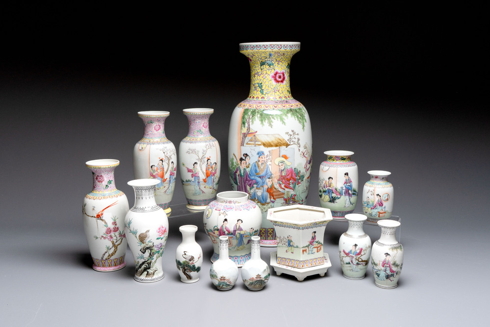 A collection of 13 Chinese famille rose vases and a jardini&egrave;re, Qianlong mark, 20th C.