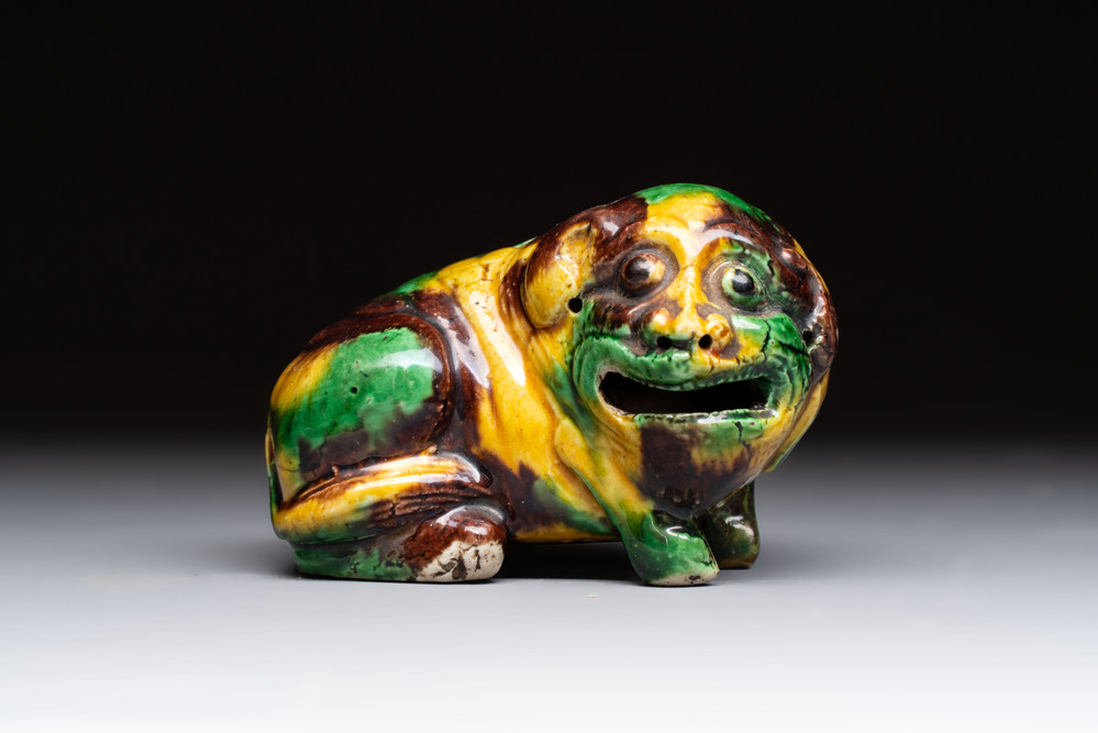 A Chinese sancai-glazed model of a dog, 19th C.