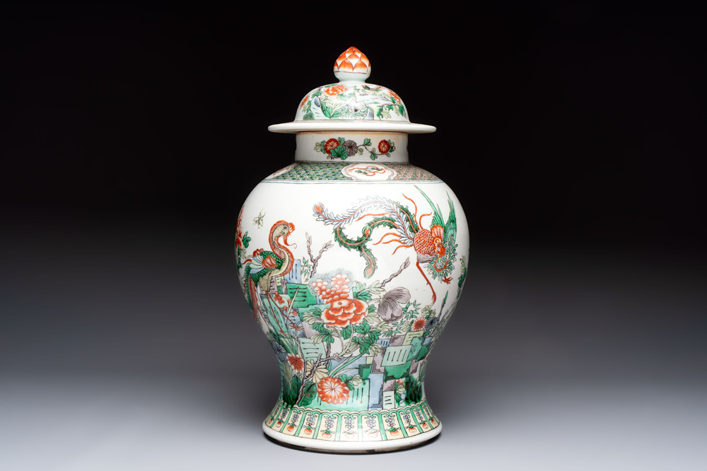 A Chinese famille verte 'phoenixes' vase and cover, 19th C.