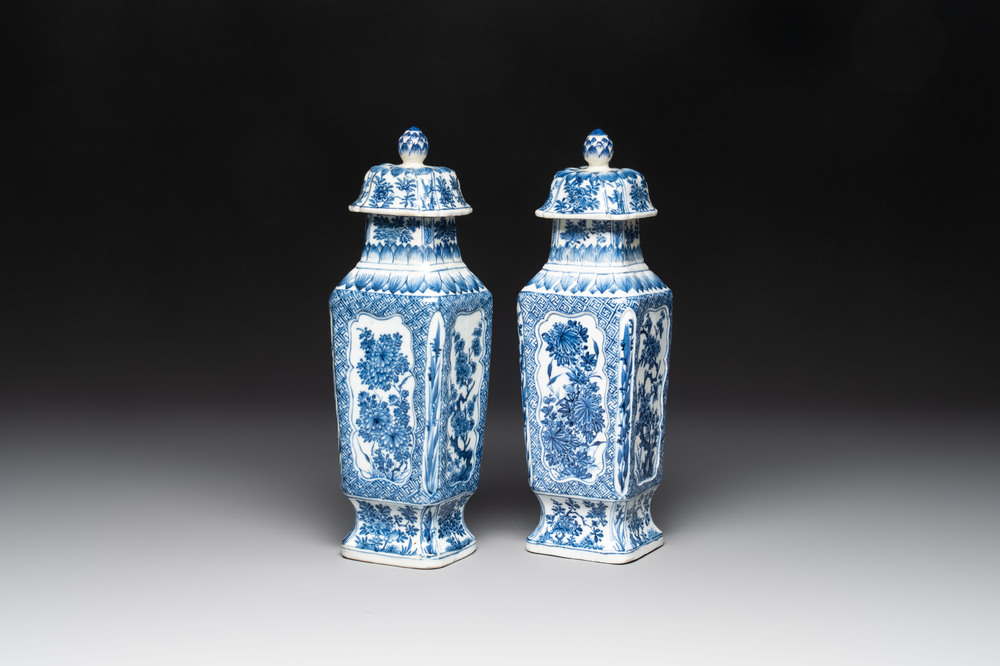 A pair of Chinese blue and white square vases and covers with floral design, Kangxi