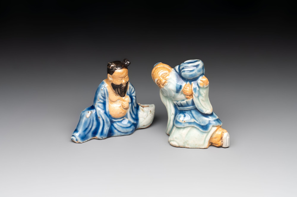 Two Chinese blue, white and celadon biscuit 'Shoulao' and 'Zhongli Quan' water droppers, Qianlong