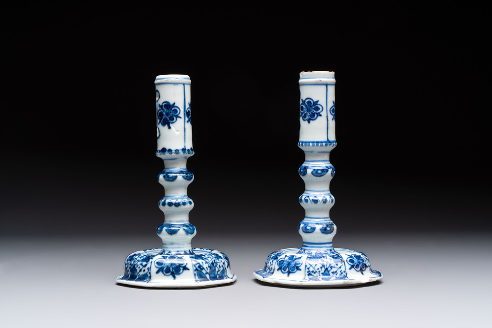 A pair of Chinese blue and white candlesticks with floral design, Kangxi