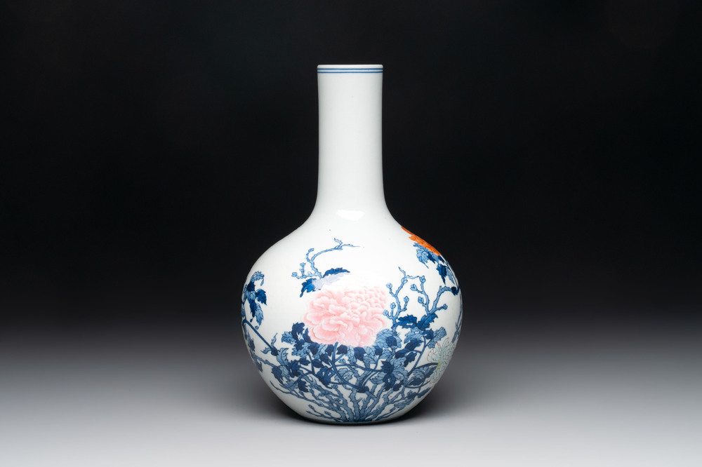 A Chinese blue, white and famille rose 'peonies' vase, Qianlong mark, 20th C.