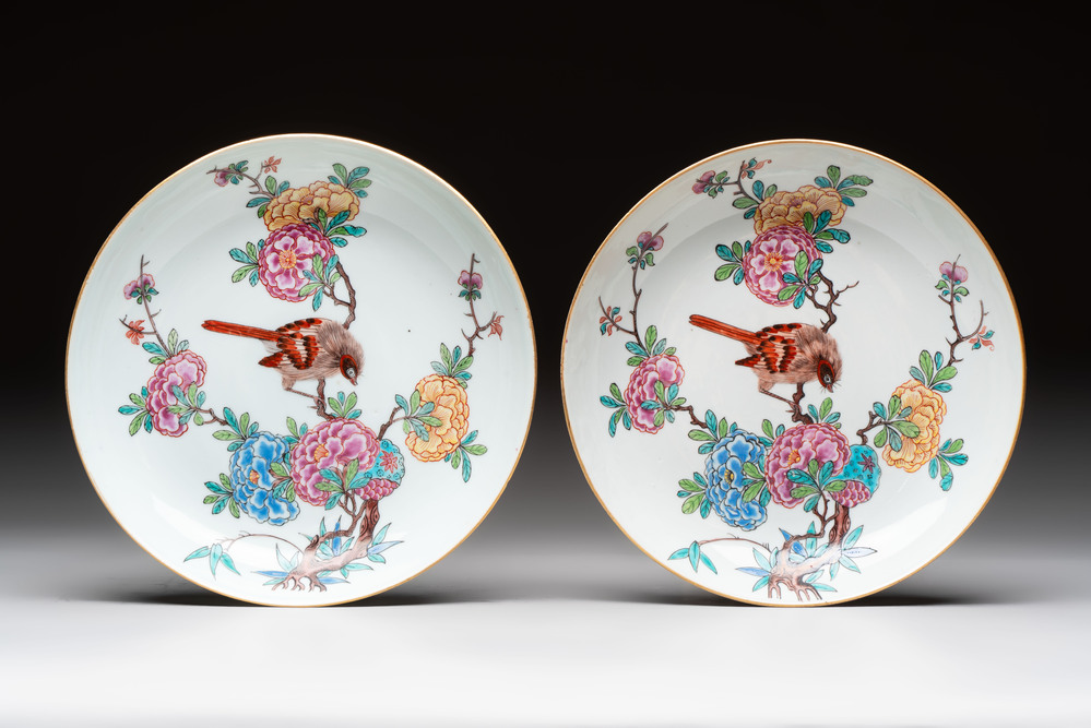 A pair of Chinese Dutch-decorated plates with birds among flowering branches, 18th C.