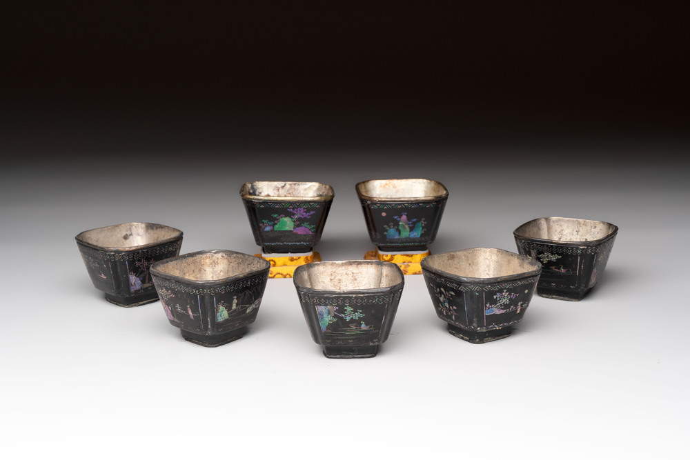 Seven Chinese silver-lined laque burgaut&eacute; wine cups and two stands, Kangxi