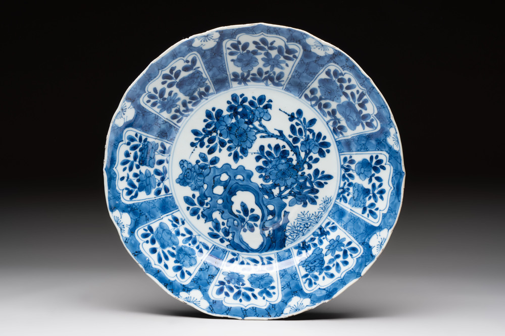 A Chinese blue and white dish with floral design, artemisia leaf mark, Kangxi