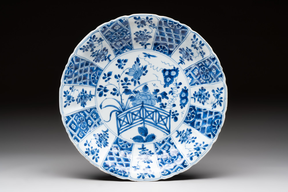 A Chinese blue and white dish with floral design, artemisia leaf mark, Kangxi