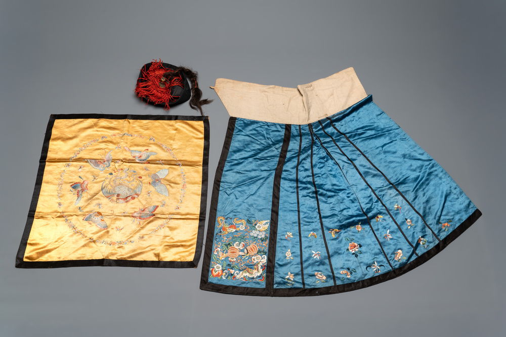 A Chinese mandarin official's court hat, an embroidered silk 'phoenix' panel and a skirt, 19th C.
