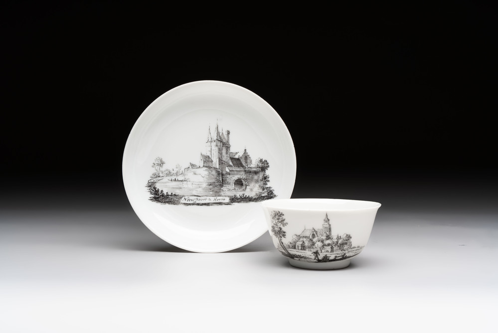 A Chinese grisaille 'Hoorn, Aspen and Valkenburg' cup and saucer, Qianlong