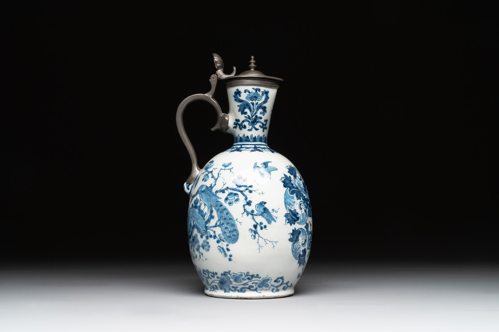 A blue and white Dutch Delft pewter-mounted armorial jug, late 17th C.