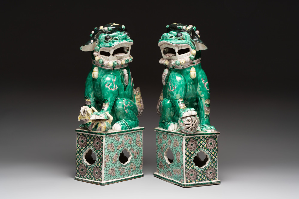 A pair of large Chinese verte biscuit Buddhist lions, 19th C.