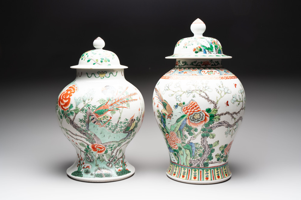 Two Chinese famille verte 'birds and flowers' vases and covers, 19th C.