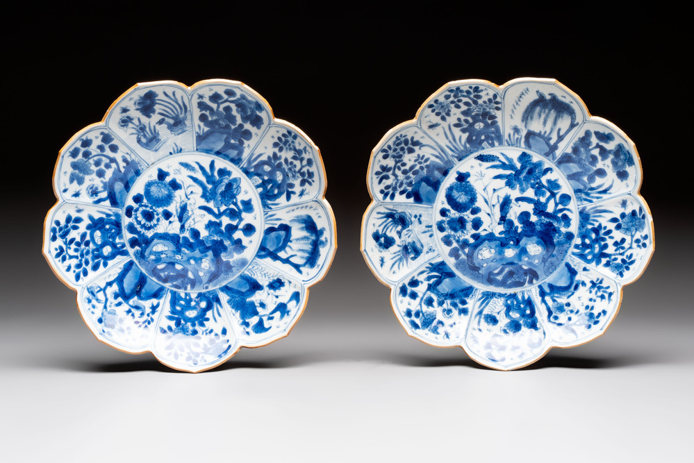 A pair of Chinese blue and white lotus-form 'Grasshopper' plates, Kangxi